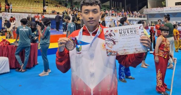 Fauzi mubbin juara 3 wushu
